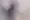Abstract blurred forms representing emotional depth and hidden mental health beneath alcohol use.