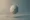 Cracked sphere floating over soft gradient background symbolizing emotional numbness after quitting alcohol.